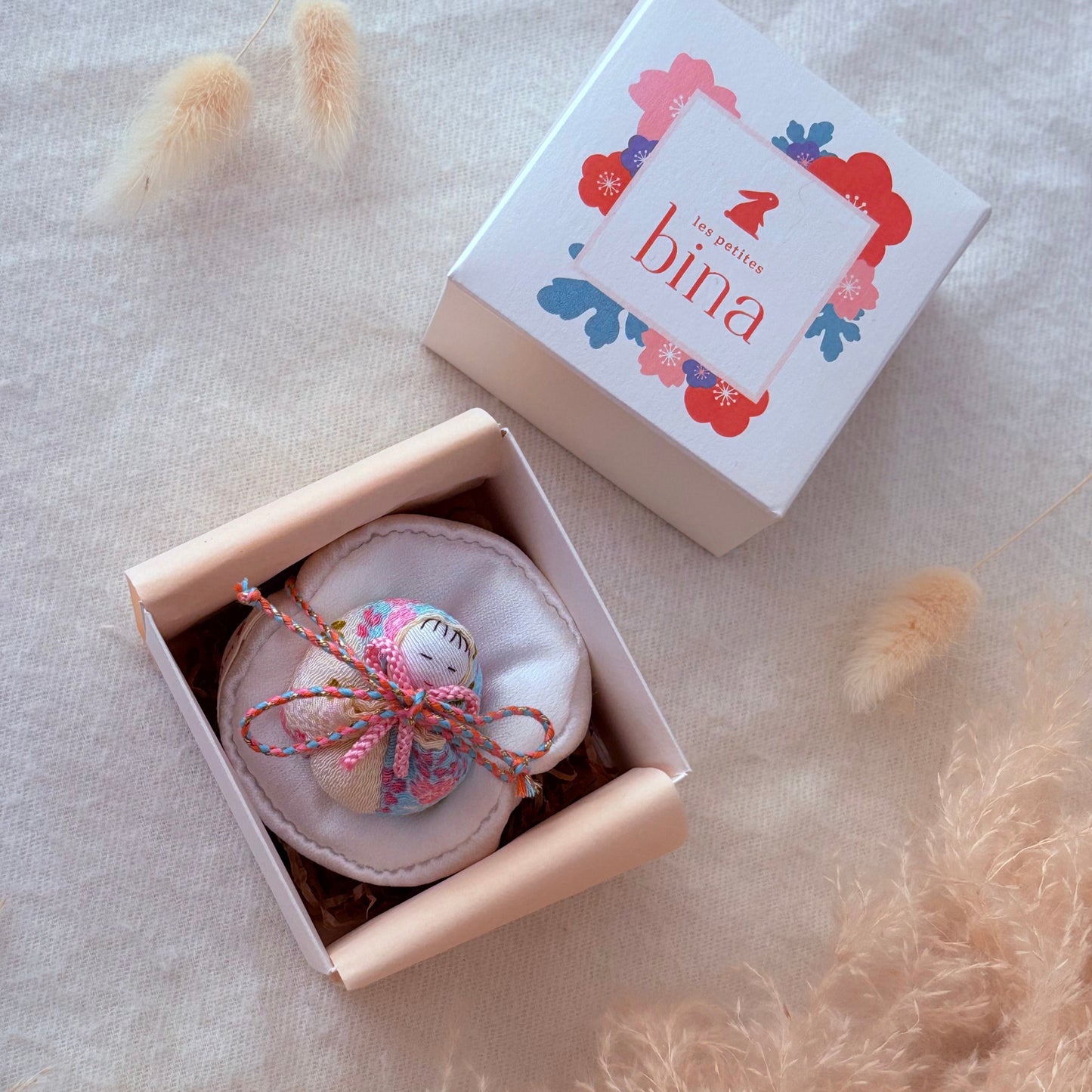 Bébé emmailloté "Aiko"