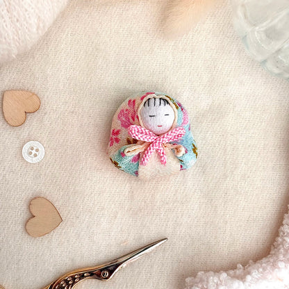 Bébé emmailloté "Aiko"